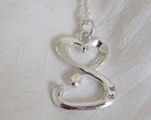Silver Sassy necklace with two diamonds