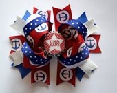 Red, White and Blue USA baby bottlecap hair bow. Great for 4th of July.