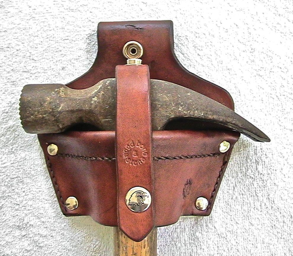 Leather hammer holster with security strap. - WoodBoneAndStone
