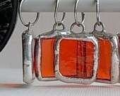Stitch Markers in orange stained glass