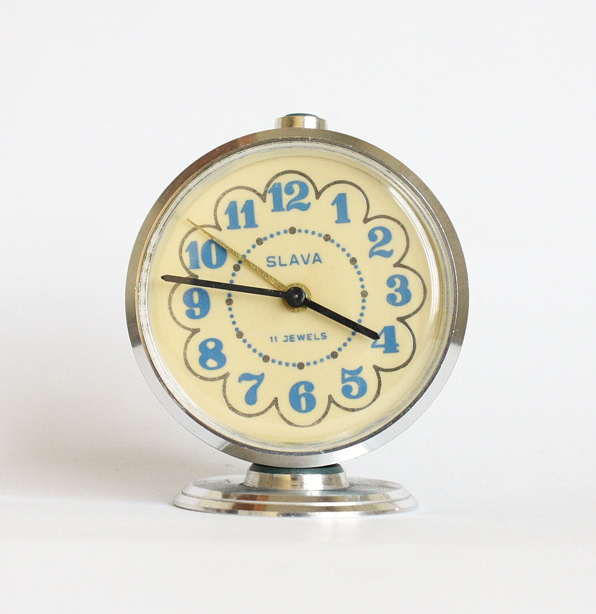 Vintage Russian mechanical alarm clock Slava from Soviet Union period green clock