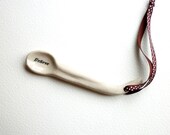 A handmade ceramic Believe Design Spoon