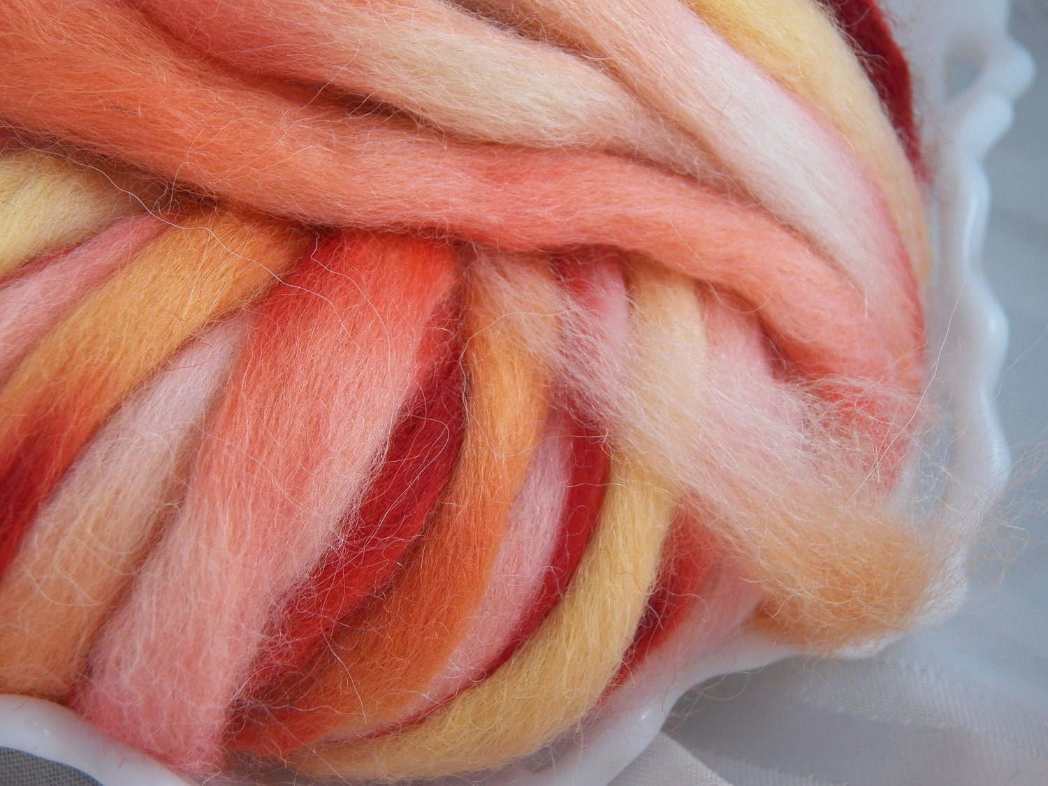 ALPACA and Merino ROVING spin up this soft cloud of the Top of the Rainbow hand dyed by Bare Sheep Yarn