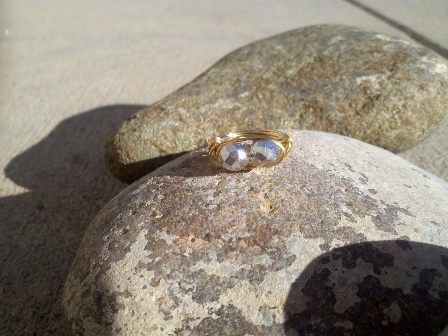 Faceted silver and crystal merlins gold wrapped ring size 7.5