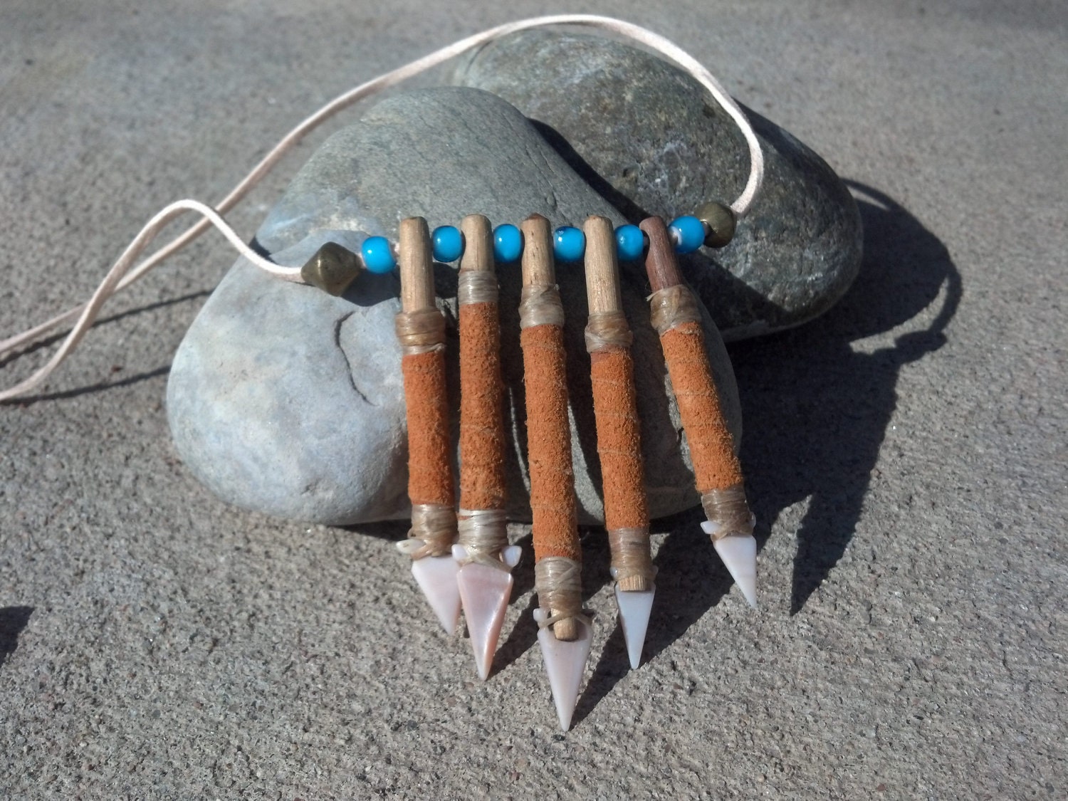 Tribal Arrow necklace vintage 60s arrows shell and wood. Nigerian brass beads on peach faux suede