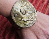 Saint Theresa cuff religious leather bracelet antique jewelry assemblage one of a kind