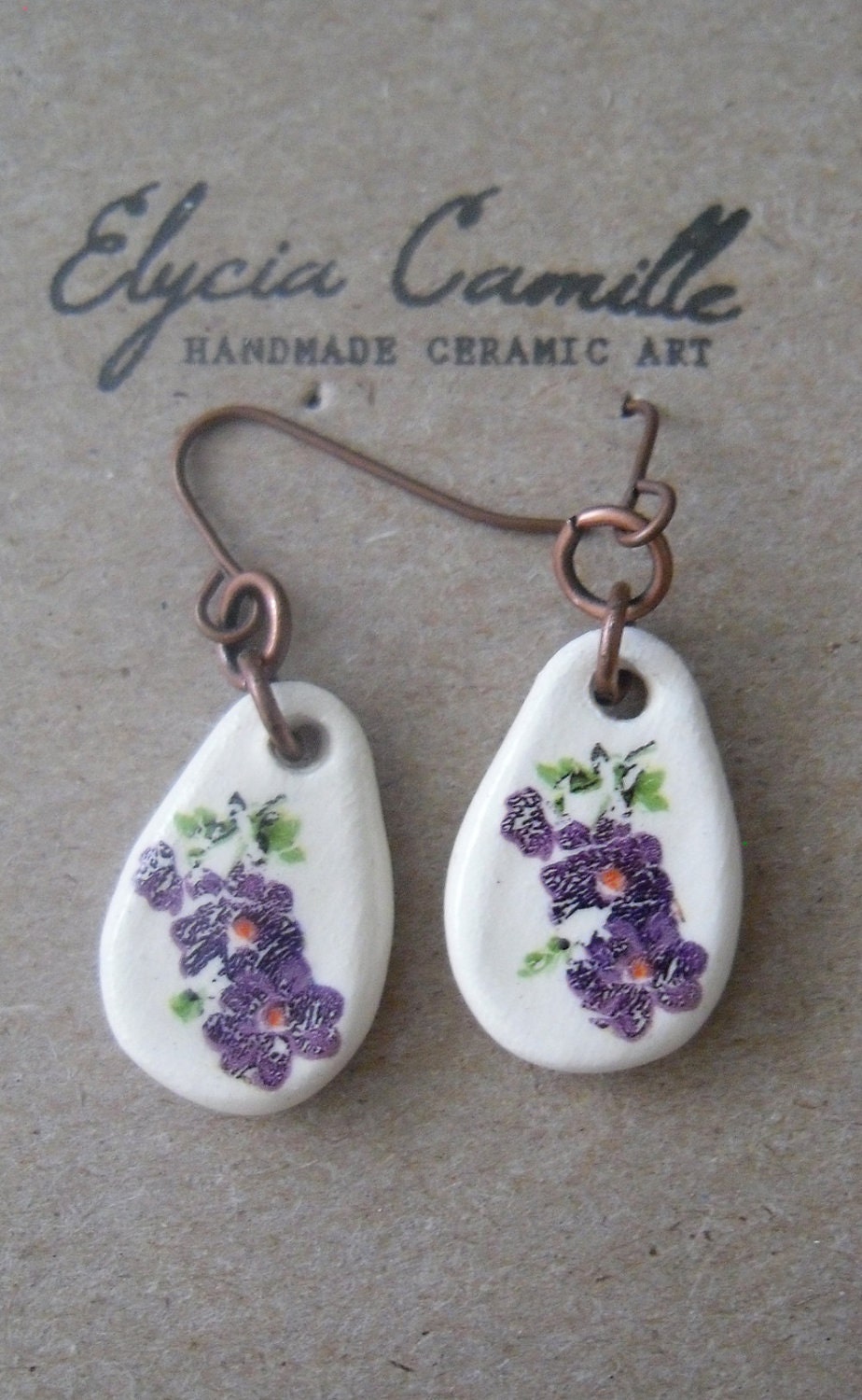 handmade ceramic earrings, dangle, purple flowers, antique copper colored fish hooks