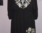 Black embroidered dress with white flowers