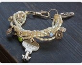 Flowers in the attic . Upcycled faux pearls, antique key, Labradorite, flowers, coffin and teapot morbid bracelet ooak