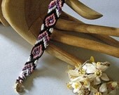 Tribal bracelet. Pink and black friendship bracelet.