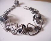 Love Triangle Bracelet in Sterling Silver