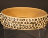Wide Ivory Celluloid Bracelet with Smokey Rhinstones.