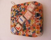 Flirt Candy Filled Resin Pendant