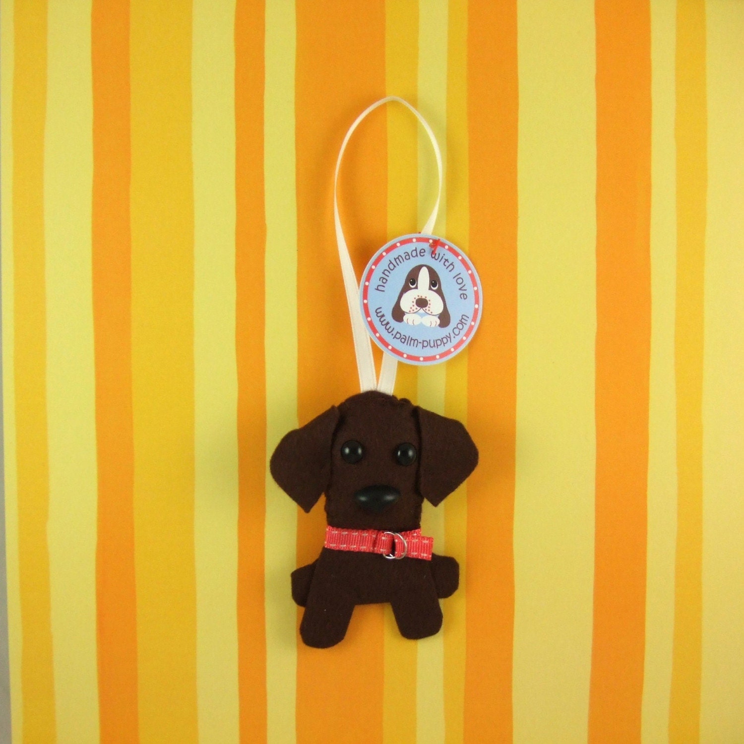 Chocolate  Lab Hanging Phlat Puppy