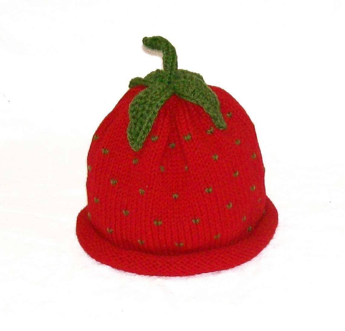 گره قرمز شیرینی توت فرنگی میوه کلاه -- اندازه نوزاد باعث سرپا نگه داشتن عکس بزرگ