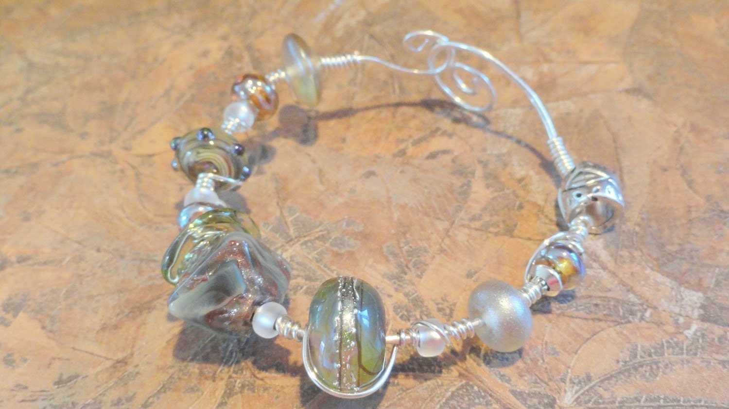 Moondust  Green Gold and Silver Lampwork Bead Wire Wrapped Bracelet