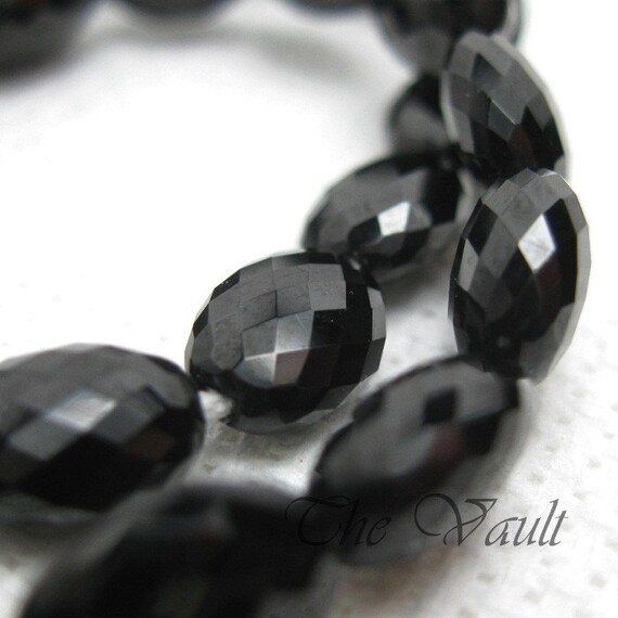 4 Black Spinel 9-10mm faceted flattened oval beads