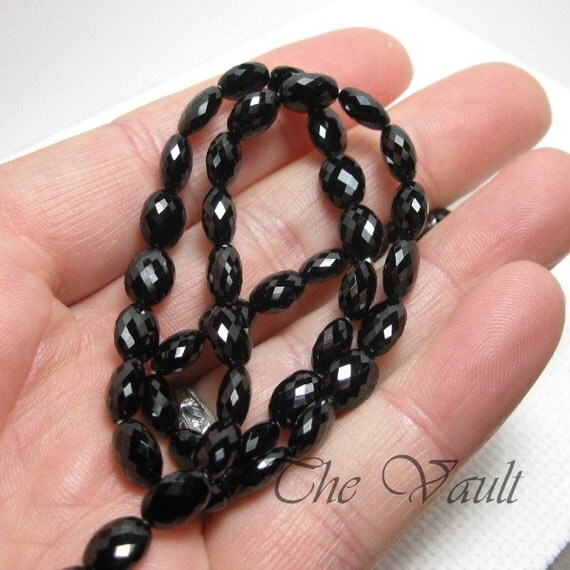 4 Black Spinel 9-10mm faceted flattened oval beads