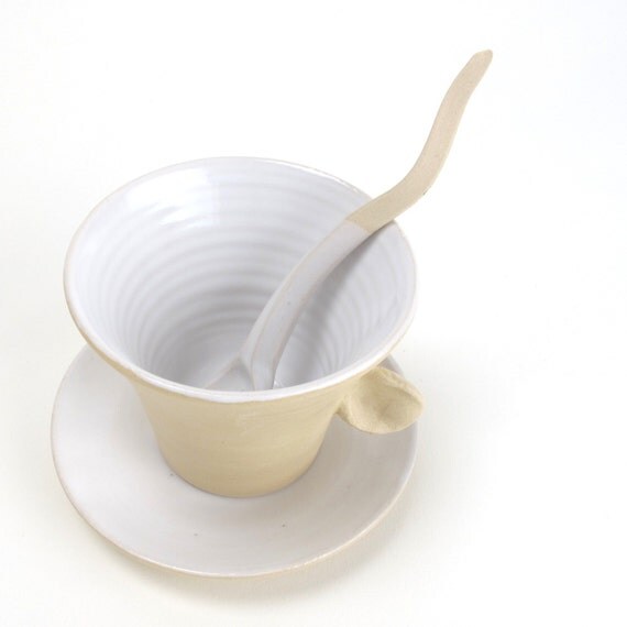Earcup and saucer with a TingleTangleSpoon
