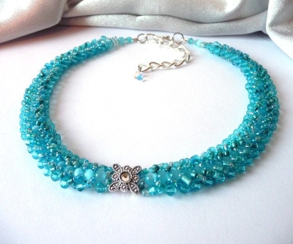 eye ocean blue Czech beads and dotted with hints of turquoise sea green