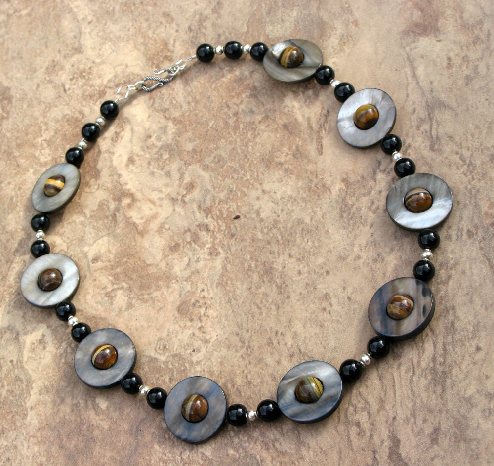 Serial Saturns Necklace