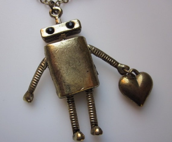 THE AWKWARD ROBOT Brings You Love. Robot Necklace with Heart in Antique Gold Finish.