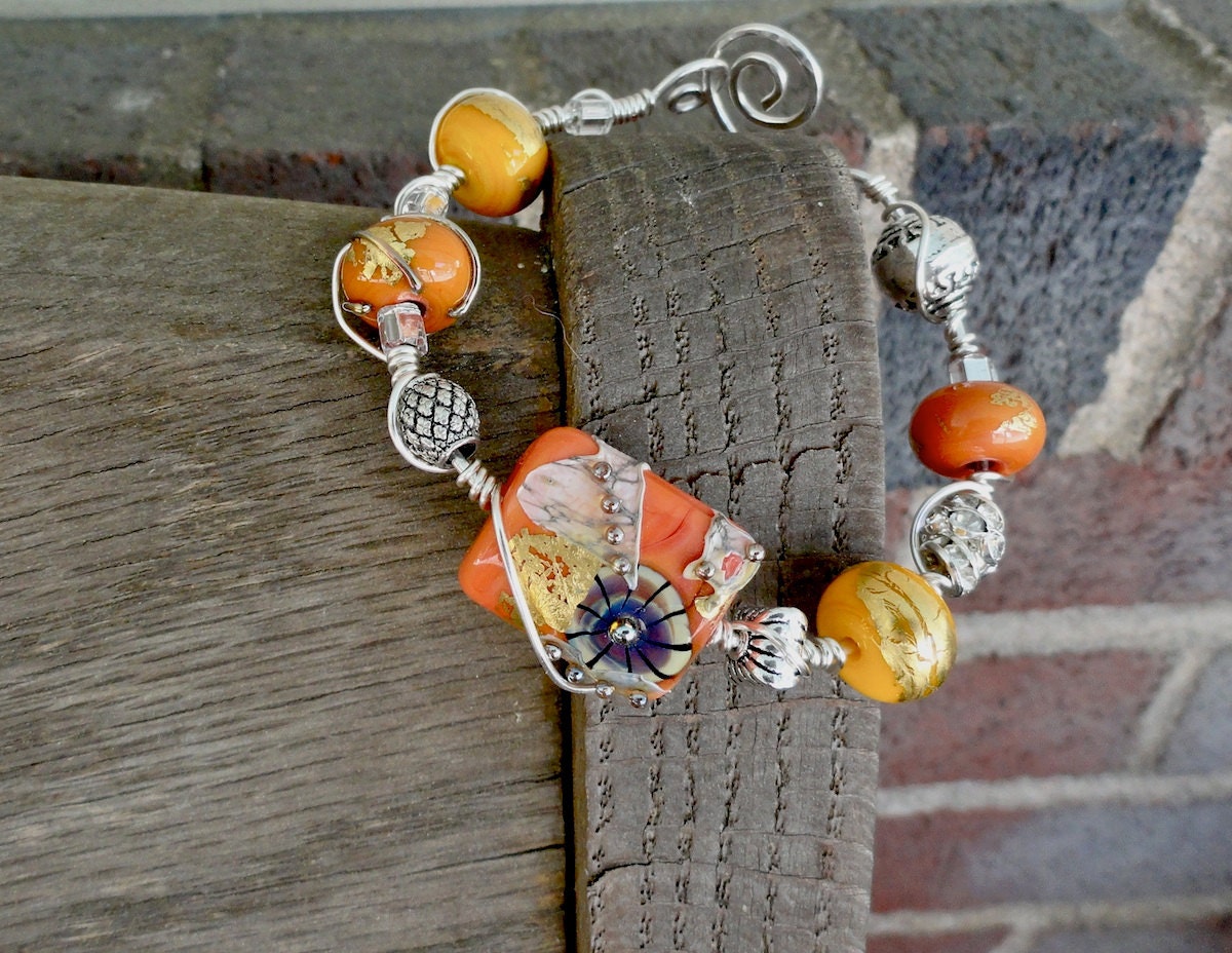 Debbie Sanders Signature Persimmon Coral Orange and Yellow Lamp work Bead  Wire Wrapped Bracelet