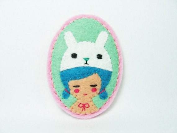 A White Rabbit and a Girl felt pin