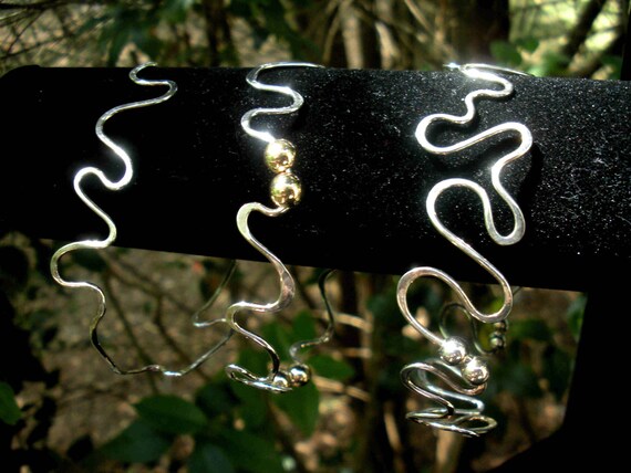 squiggle bangle with balls