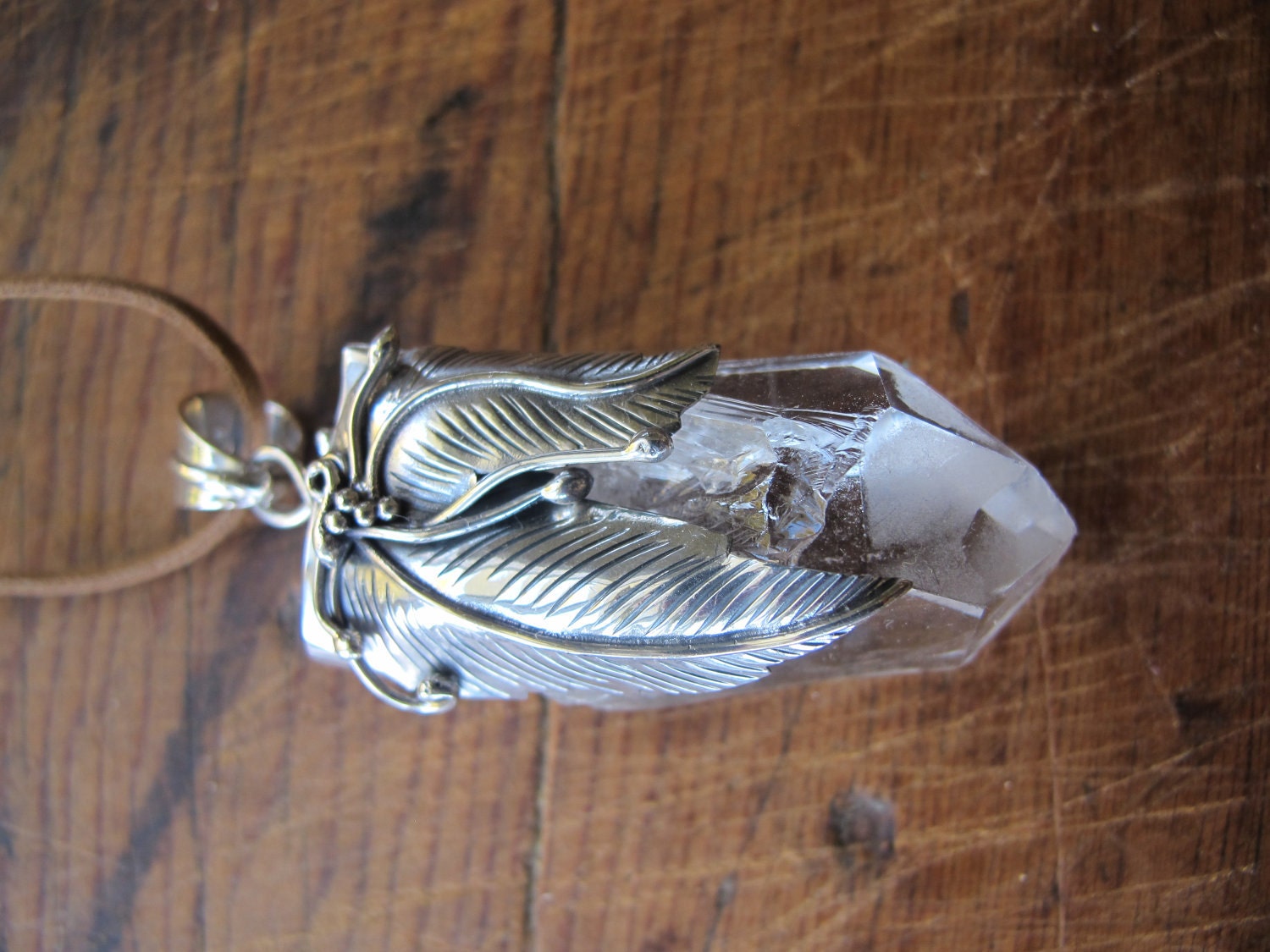 Crystal pendant with sterling silver filigree