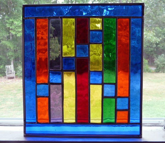 Stained Glass Panel in textured, vibrant blue and rainbow colors