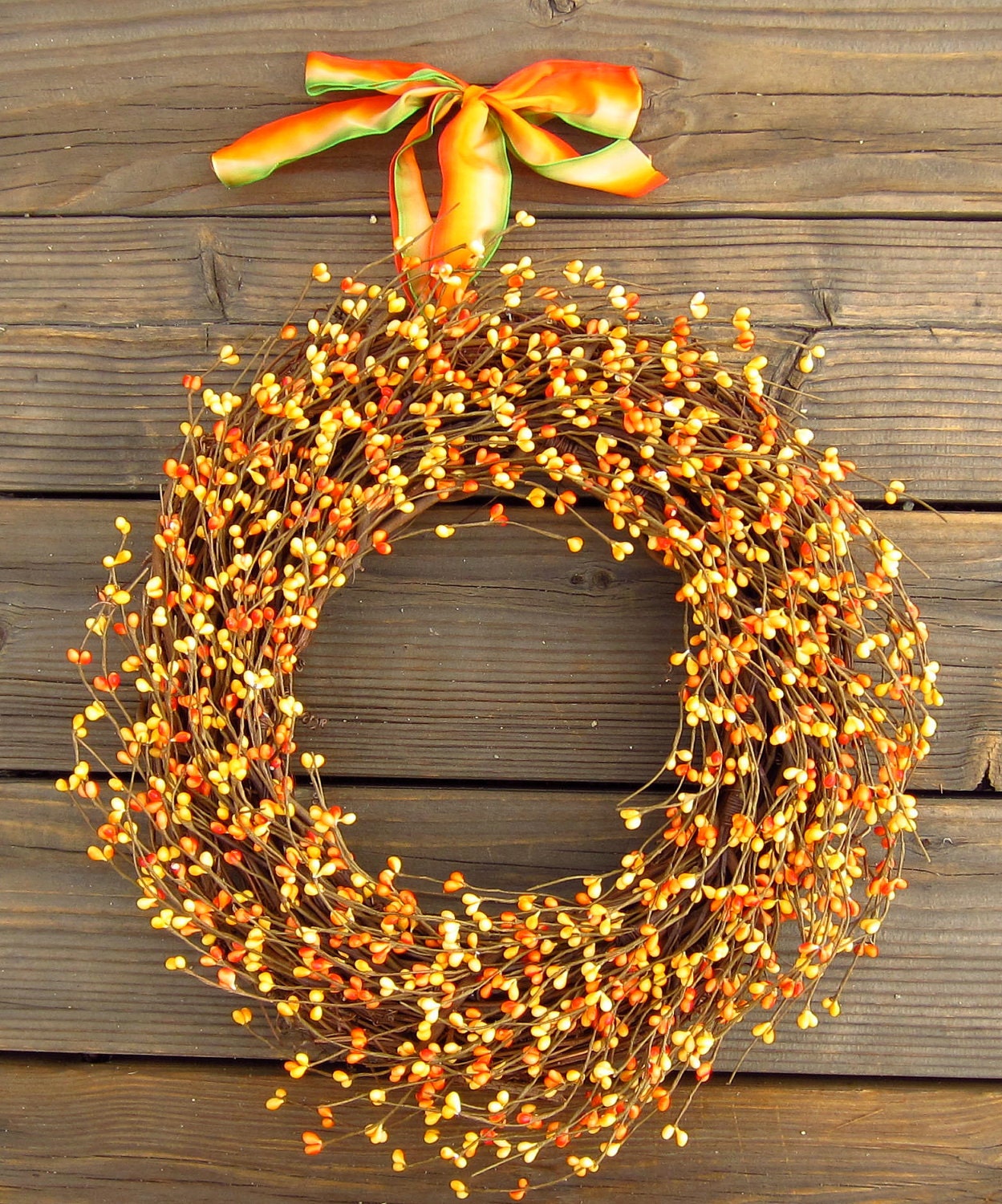 Orange berry wreath for fall
