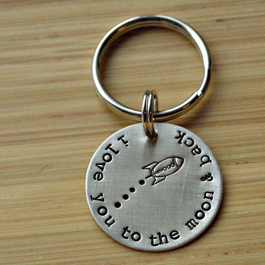 hand stamped sterling silver i love you to the moon and back keyring with rocket ship for men or women