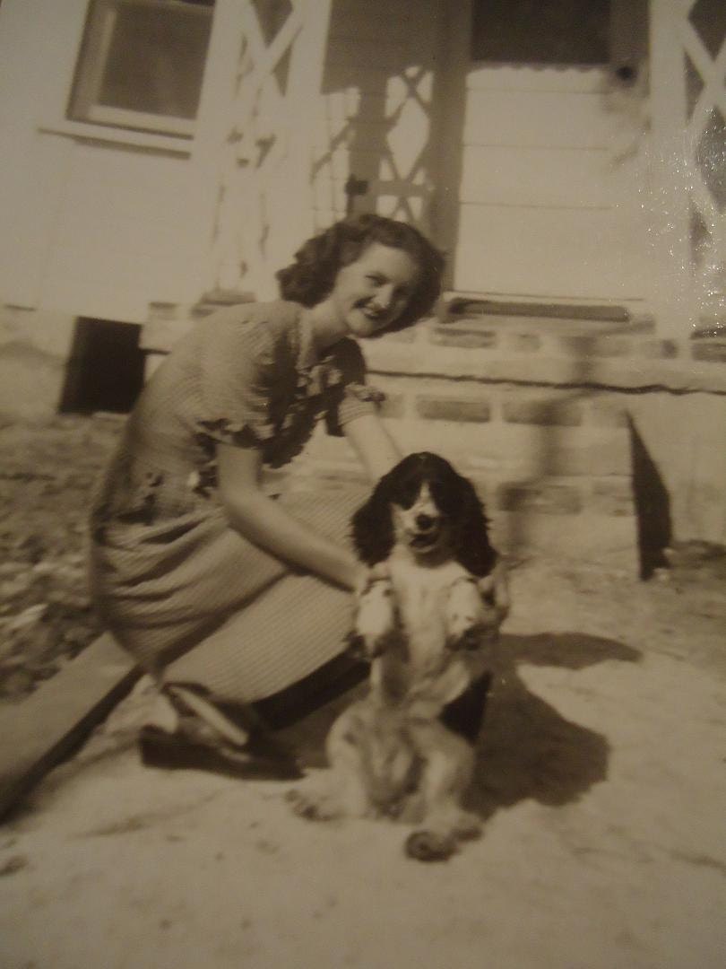 Vintage Black and White Early 1940s Photo of a Woman and her Puppy