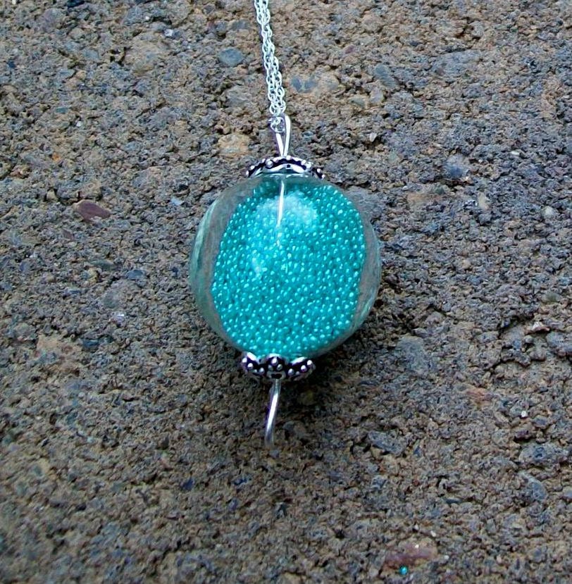 Turquoise Glass Necklace Tiny Blue Beads in a Hollow Glass Globe with Sterling Silver