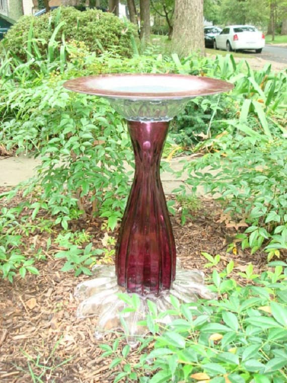 Bird bath or bird feeder.  Heavy duty burgundy and silver garden art."The Ruby" is repurposed glass garden art. Upcycled garden art.