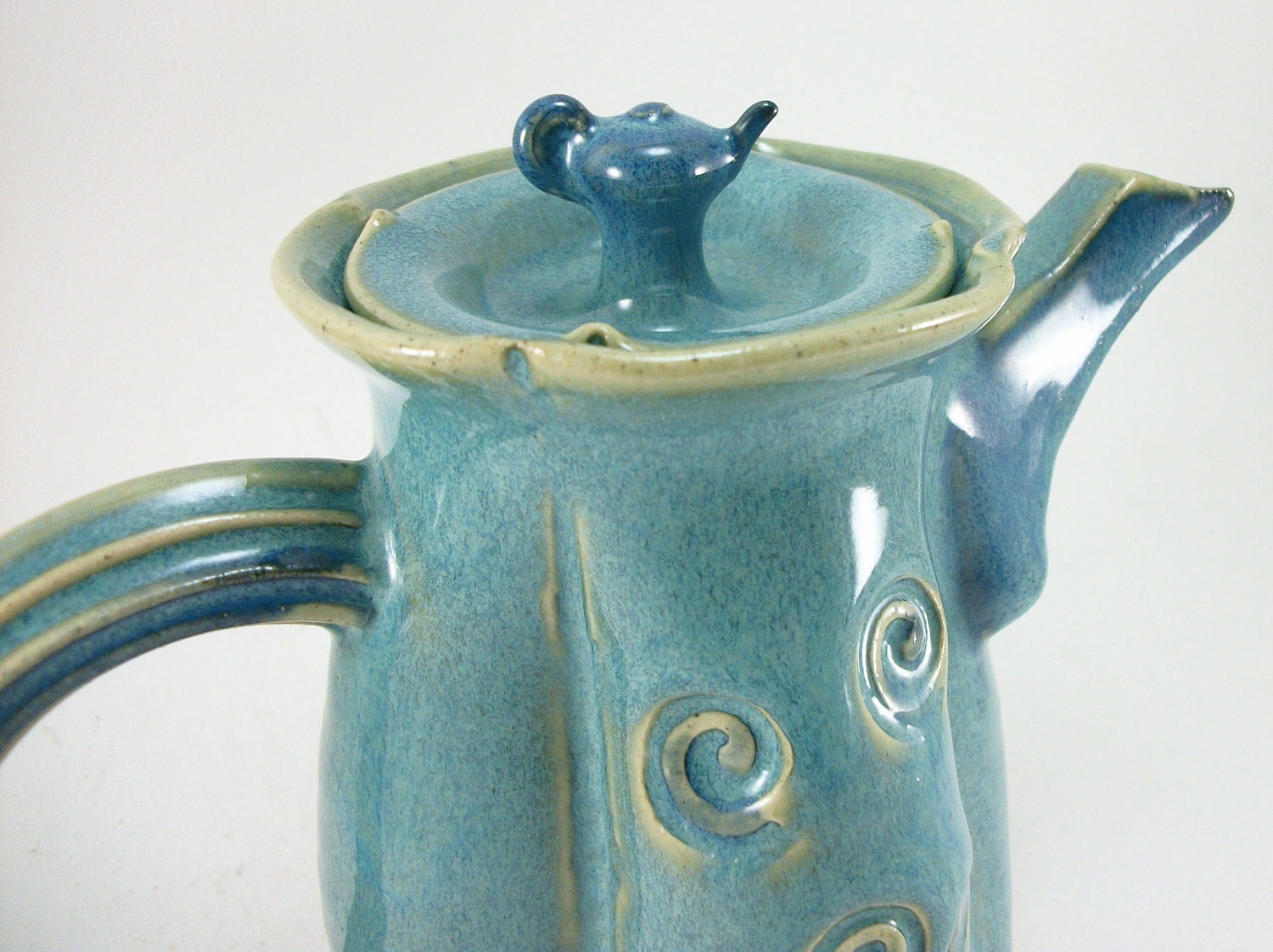 small turquoise teapot