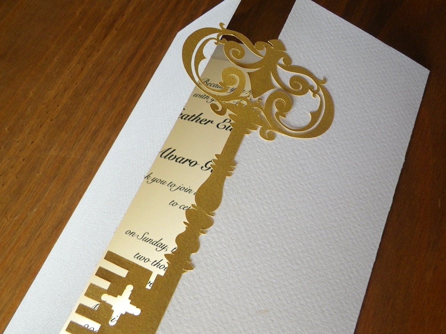 This is a very elegant wedding invitation set with an old vintage key 