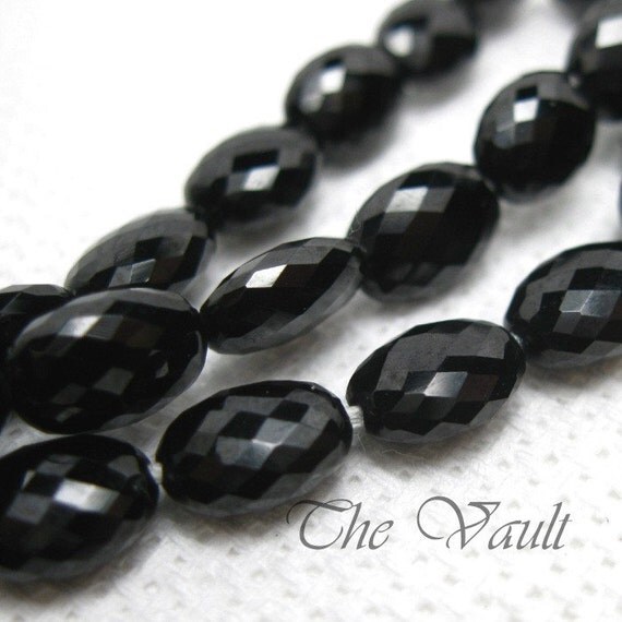 4 Black Spinel 9-10mm faceted flattened oval beads