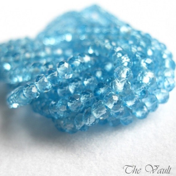 40 Topaz 3mm faceted rondelles