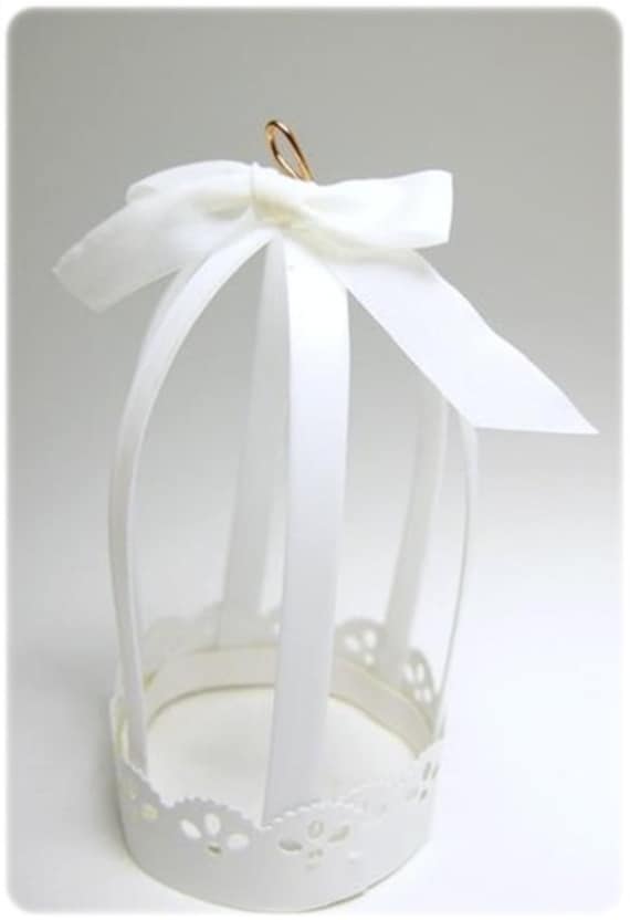 Elegant white birdcage with light ornamental wedding table decoration