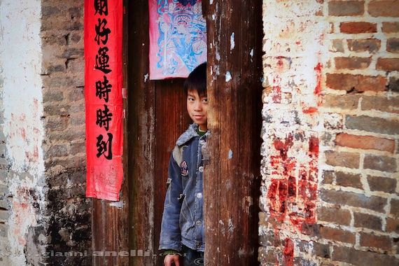 Boy at the door. Xin Zai, China 2011. 16x11