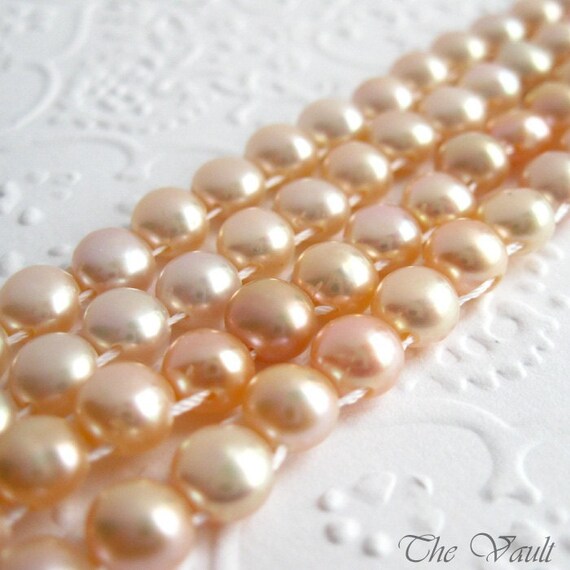 Pearls, double drilled buttons, peach, 6mm, 16 inch full strand