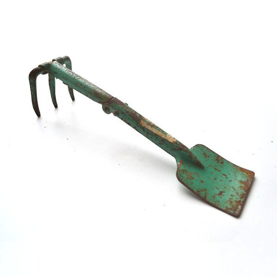 rusty shabby chippy paint garden tool for children half rake half shovel  offered by Elizabeth Rosen