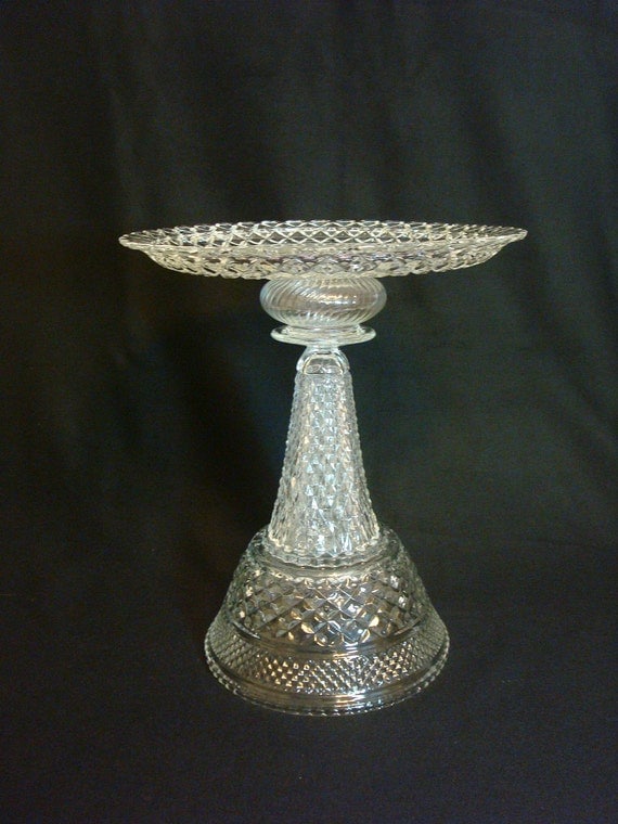 Diamonds reflect the light on every surface of this pedestal cake stand with 14-inch plate.  Made with repurposed glass.