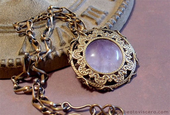 Filigree wrapped medallion pendant