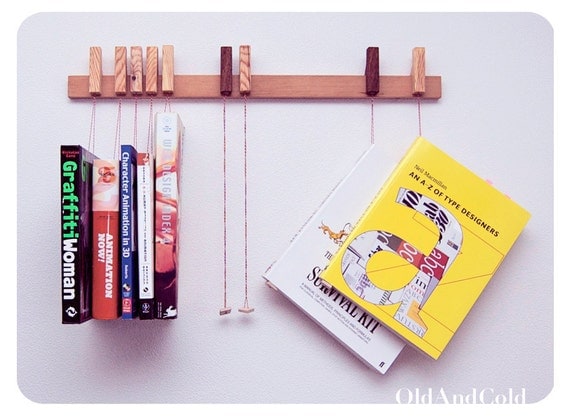 RESERVED - Custom made wooden book/magazine rack in Pine. Movable pins.The pins also work as bookmarks.