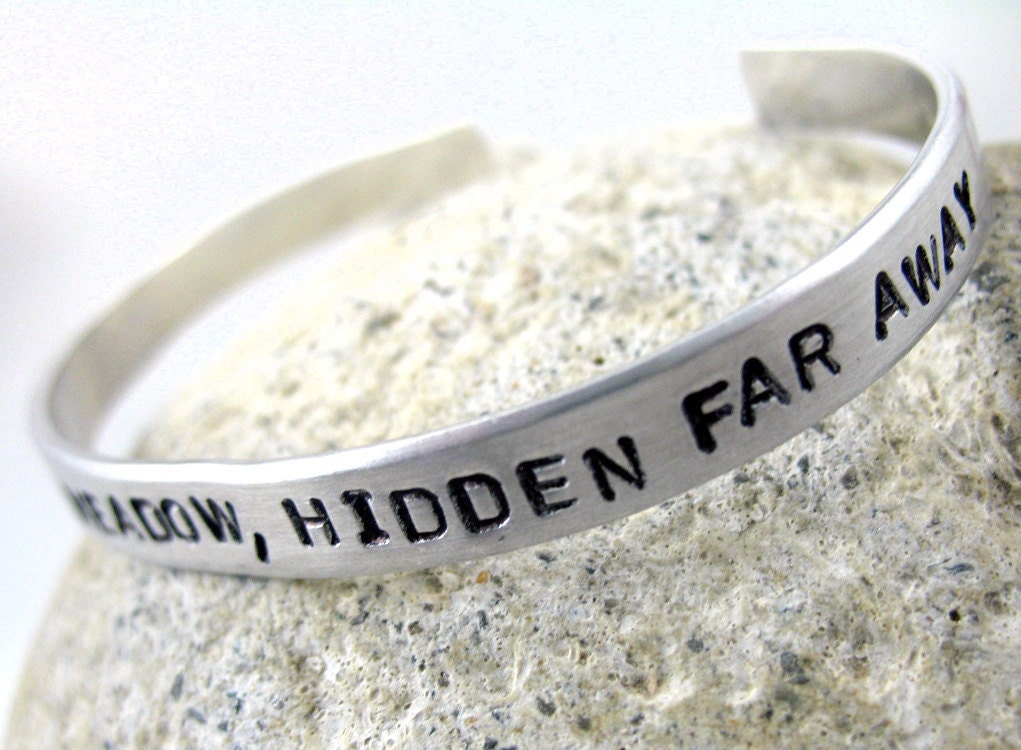 Hunger Games Inspired Bracelet - Deep in the Meadow, Hidden Far Away - Hand Stamped Aluminum Cuff - customizable