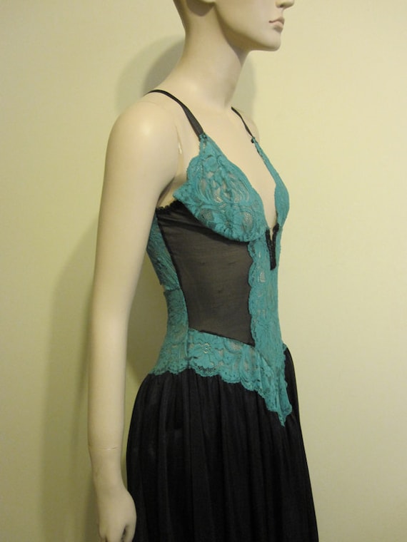 vintage 60s plunge front saloon girl teal black (etsy)