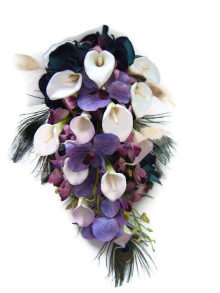 Purple and blue Cascade bouquet peacock feathers Lavender Calla lilies 